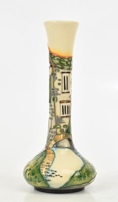 Lot 86 - MOORCROFT; a limited edition bottle vase,...
