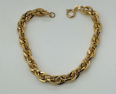 Lot 795 - A 9ct yellow gold open hoop link bracelet,...