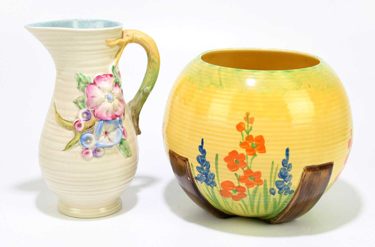 Lot 213 - MYOTT & SONS; an Art Deco vase with hand
