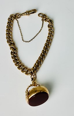 Lot 800 - A 9ct yellow gold curb link short chain with...