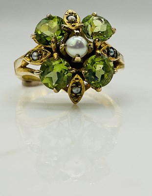 Lot 802 - A 9ct yellow gold green peridot and seed pearl...