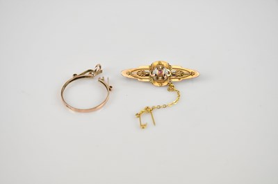 Lot 464 - A 9ct gold ruby and seed pearl bar brooch,...
