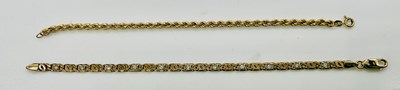 Lot 816 - A 9ct yellow gold curb link bracelet and a 9ct...