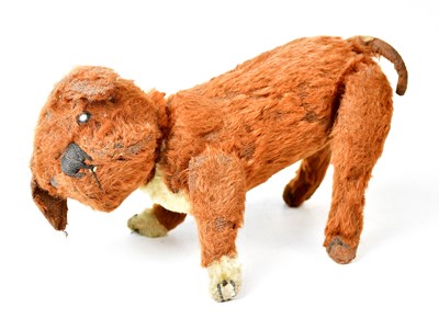 Lot 237 - ATTRIBUTED TO STEIFF; a stuffed toy pug dog,...