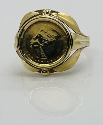 Lot 837 - A 14ct yellow gold signet ring, set with an...