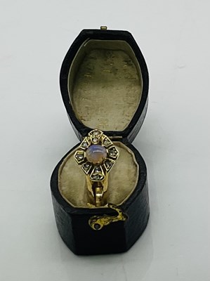Lot 839 - An unmarked yellow metal opal cabochon and...