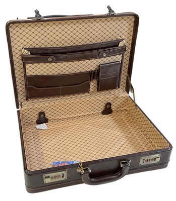 Lot 329 - MILANO; a Tuscan leather briefcase with orange...