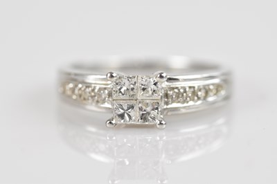 Lot 2302 - An 18ct white gold diamond set ring, set with...