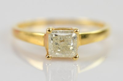 Lot 485 - A gold diamond solitaire ring, the claw set...