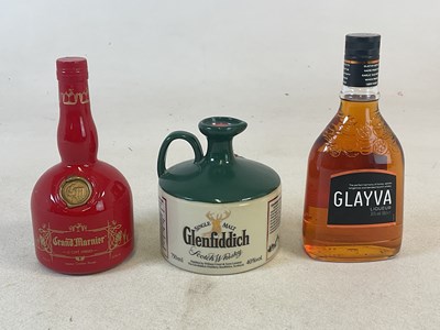 Lot 302 - WHISKY AND LIQUEUR; three bottles comprising...