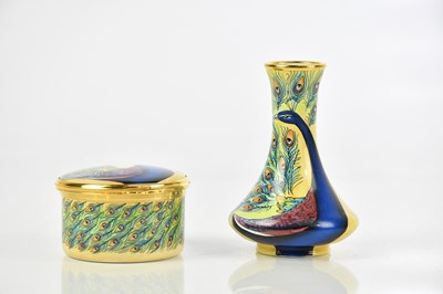Lot 123 - MOORCROFT; an enamel vase decorated with a...