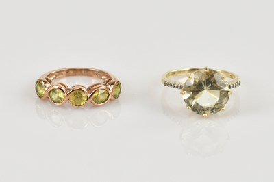Lot 506 - Two 9ct gold dress rings, one with large green...