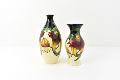 Lot 132 - MOORCROFT; two vases, both decorated in the...