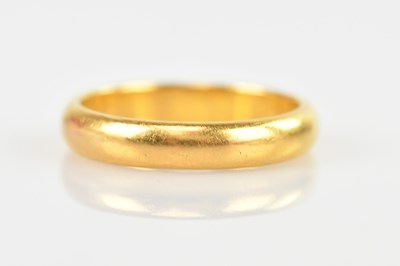 Lot 482 - A 22ct gold band ring, size O, approx 5.4g.