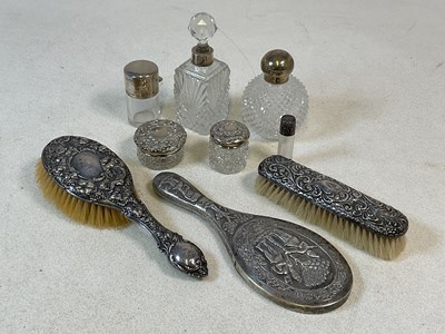 Lot 471 - A hobnail cut globular silver mounted perfume...