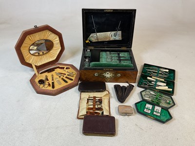 Lot 137 - A Victorian walnut and brass mounted sewing...