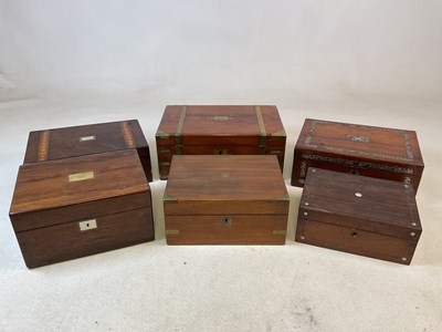 Lot 122 - Six mahogany, walnut and rosewood travelling...