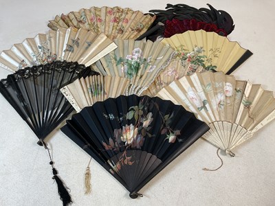 Lot 256 - A collection of vintage fans, some silk...