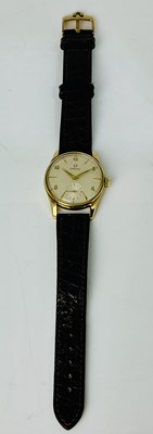 Lot 686 - OMEGA; a gentleman's vintage 9ct yellow gold...