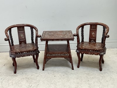 Lot 1534 - A pair of Chinese rosewood horseshoe elbow...