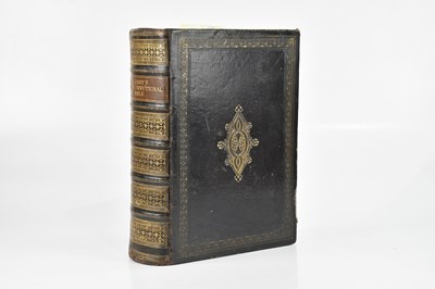 Lot 662 - A 19th century leather bound family Bible.