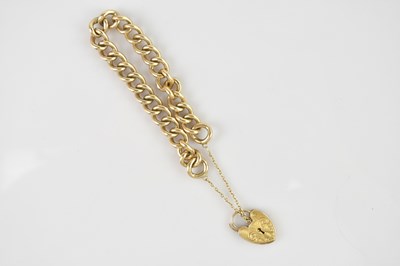 Lot 564 - A 9ct gold bracelet, with safety chain and...