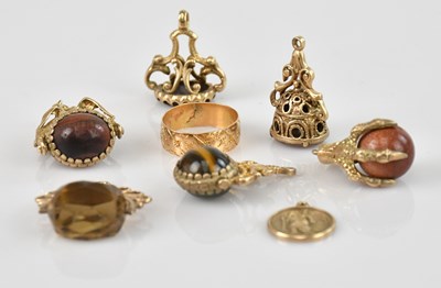 Lot 456 - Six watch chain fobs, one with three sided...