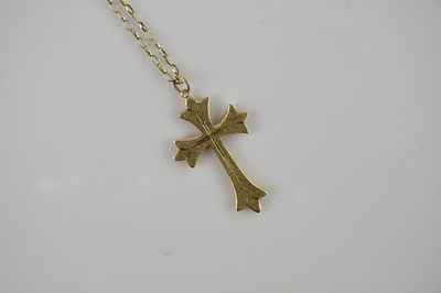 Lot 536 - A 9ct gold cross pendant, length 4.2cm, on a...