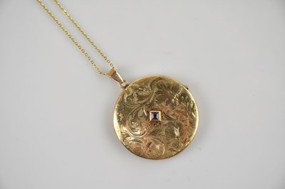 Lot 528 - A 9ct gold circular double locket, with square...