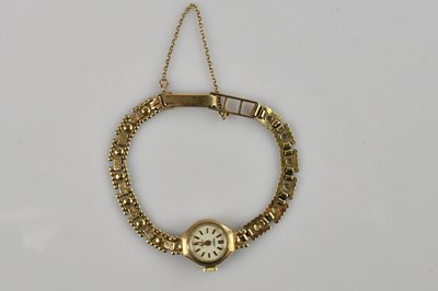 Lot 648 - REGENCY; a lady's 9ct gold wristwatch, the...