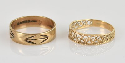 Lot 509 - Two 9ct gold rings comprising a band ring with...
