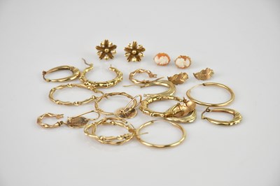 Lot 550 - Twelve pairs of 9ct gold earrings including...