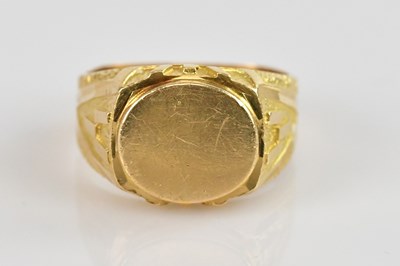 Lot 495 - A yellow gold ring with cut oval table and...