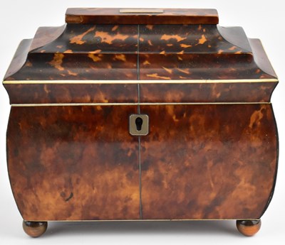 Lot 219 - A George III tortoise shell veneered tea caddy...