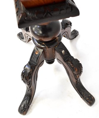 Lot 6 - A Victorian walnut sewing table, the top with...