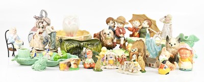 Lot 1658 - A collection of decorative ceramic figures,...