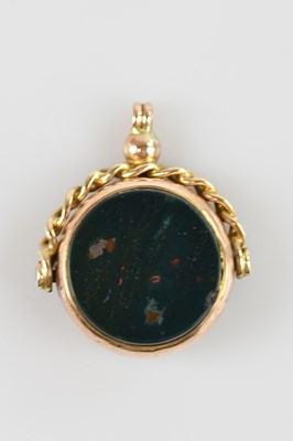 Lot 463 - A gold coloured metal swivel watch chain fob,...
