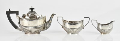 Lot 113 - An Edwardian hallmarked silver three piece...