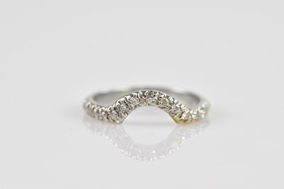 Lot 2454 - A white metal diamond set dress ring, stamped '...