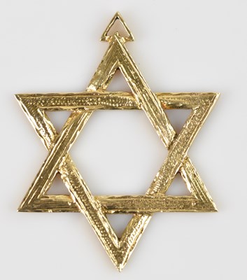Lot 2106 - A yellow metal Star of David textured pendant,...