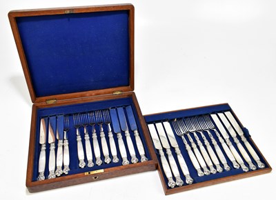 Lot 1059 - A mahogany cased set of twelve silver plated and mother of pearl fruit knives and forks