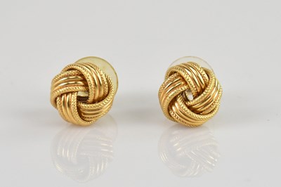Lot 554 - A pair of 9ct gold large knot stud earrings,...