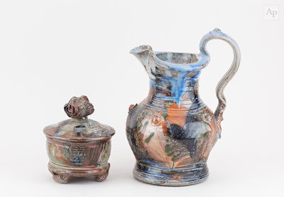 Lot 103 - RICHARD DEWAR; a faceted salt glazed jug...