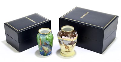 Lot 106 - MOORCROFT; two enamel vases comprising one...