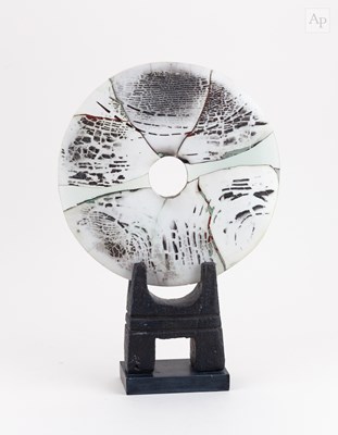 Lot 101 - PETER HAYES (born 1946); a raku disc with...