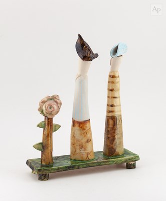 Lot 135 - An earthenware sculpture of two figures...