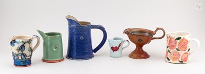 Lot 139 - A group of stoneware and porcelain jugs by...