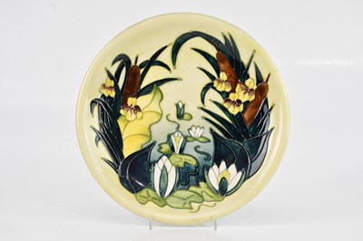 Lot 1957 - MOORCROFT; a 'Lamia' pattern plate, diameter...
