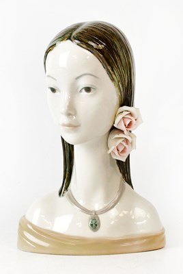 Lot 107 - LLADRÓ; a porcelain bust of a young woman with...