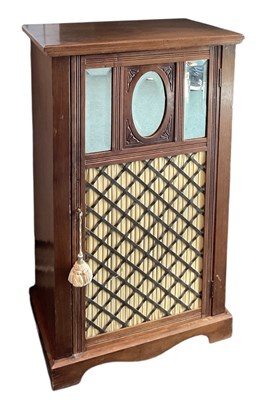 Lot 33 - An early 20th century mahogany music cabinet,...